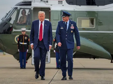 US President Donald Trump with Colonel Christopher Robinson 89th Airlift Commander after stepping off Marine One at Joint Base Andrews, Maryland (Image/Reuters)