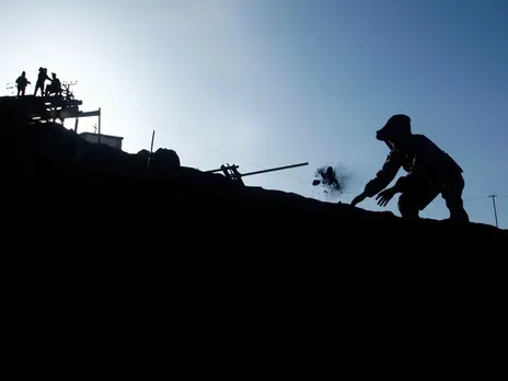 An Afghan miner sifts through coal at the Karkar coal mine in Pul-i-Kumri, approximately 170 km north of Kabul (File Photo/Reuters)