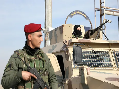 A member of the Kurdish-led Syrian Democratic Forces (SDF) stands on a street in Hasakah, Syria, following the rebels’ seizure of the capital and ousting of Bashar al-Assad (File Photo/Reuters)