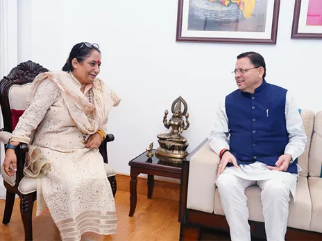 Uttarakhand CM Dhami meets Speaker Ritu Khanduri Bhushan at her residence. (Photo/ANI)