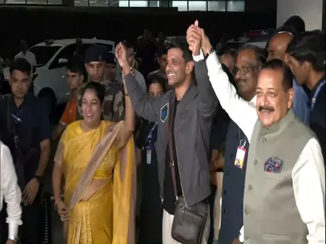 India’s astronaut Group Captain Shubhanshu Shukla being welcomed at Delhi airport by Union Minister Jitendra Singh and Delhi CM Rekhan Gupta after his return. (Photo/ANI)