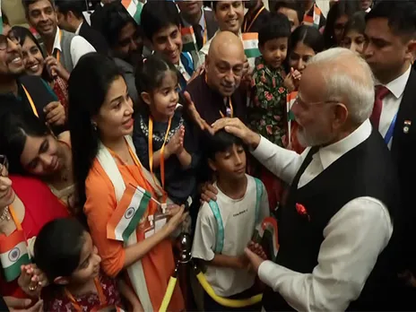 Members of Indian diaspora give warm welcome to PM Modi in Tianjin. (Photo/ANI)