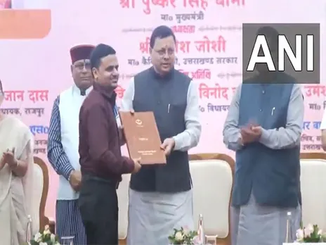 Uttarakhand CM distributes appointment letters to assistant teacher (Photo/ANI)