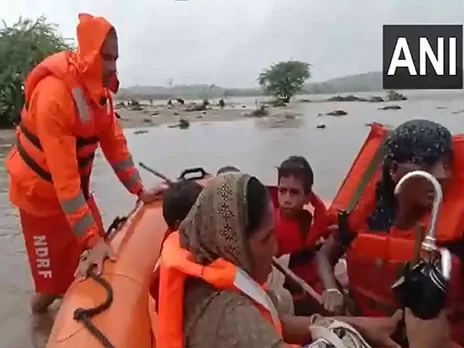 SDRF team rescues 9 people stranded in flooded Sabarmati River near Danta. (Photo/ANI)