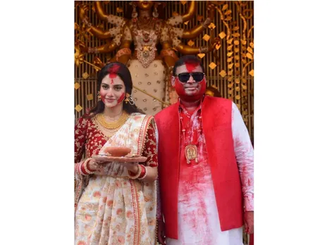 A file picture of Nusrat Jahan at Chaltabagan Sindoor Khela with Sundeep Bhutoria, Chairman, Manicktala Chaltabagan Lohapatty Durga Puja Committee