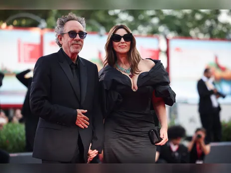 Actor Monica Bellucci, Director Tim Burton (File photo: Reuters)