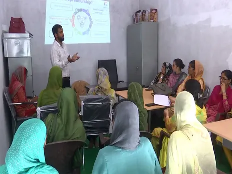 NRLM Block program manager Kamran Hanif interacts with beneficiaries in Rajouri (Photo/ANI)