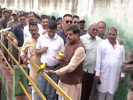 MP CM Mohan Yadav feeding the birds (Photo/ANI)