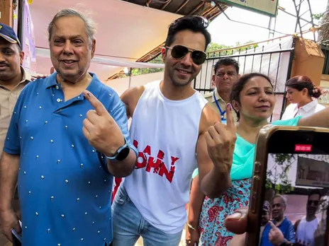 Veteran filmmaker David Dhawan and actor Varun Dhawan (Image source: ANI)