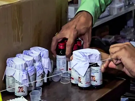 The Drugs Department sealing the Coldrif cough syrup containers. (File Photo/ANI)