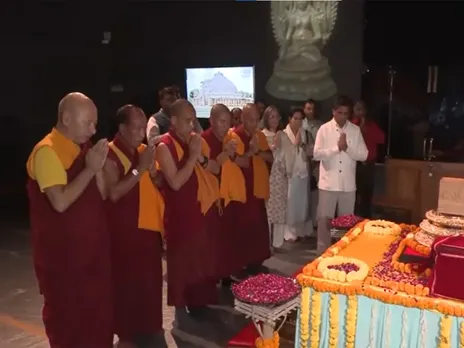 Monks offer prayers to Buddha relics. (Photo/ANI)