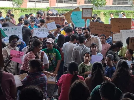 SAU students protest outside the administrative block demanding action in the sexual assault case (Photo/ANI)