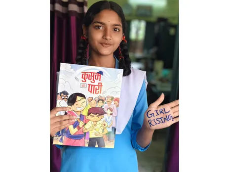 A Girl Reading Girl Rising Comic Book on Kusum's Adventurous Innings