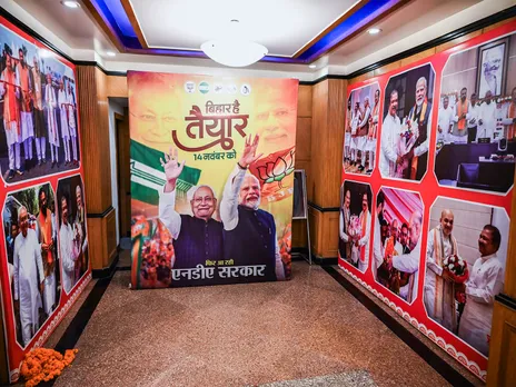 Poster of National Democratic Alliance installed at BJP media centre in Patna (Photo: ANI)