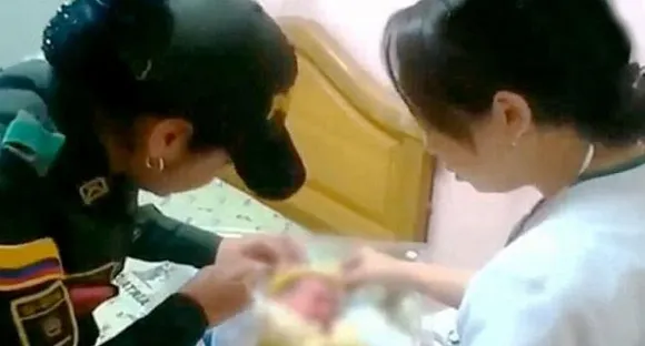 Salute her! Lady police officer breast feeds new born to save her life