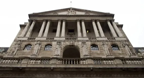 Bank of England cuts UK growth forecasts, holds rates