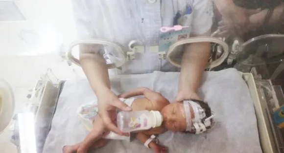Baby in China as small as diaper survives