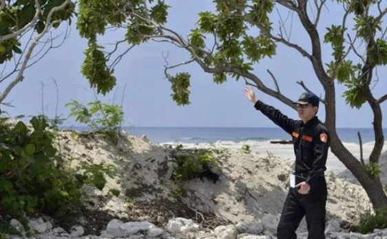 Taiwan gives tour of disputed island in bid to boost claim 