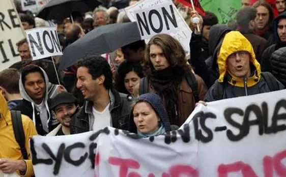 Tear gas, clashes mar French protests over labor law reforms