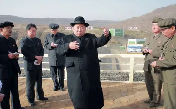 North Korea's Kim hails 'successful' submarine missile test 