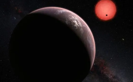 Scientists discover three â€˜potentially habitableâ€™ planets