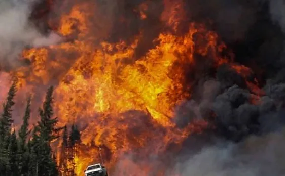 Canada fire 'out of control,' doubles in size