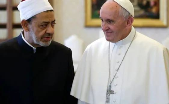 Pope and top imam embrace in historic meeting at Vatican