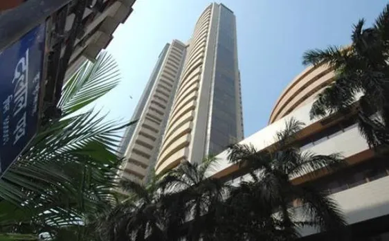 Sensex logs first rise in five sessions on earnings lift