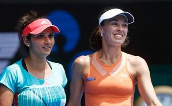 Sania, Martina labour into second round of French Open