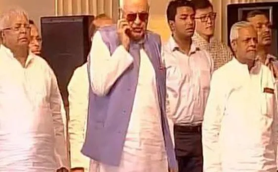 Caught on camera: Farooq Abdullah talking over phone during National Anthem