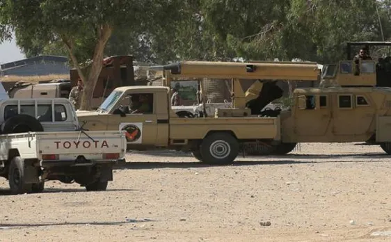 Attacks in Baghdad, near Iraqi capital kill at least 20