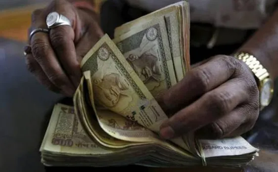 Rupee extends losses for 2nd day, down 5 paise to 66.76