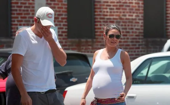 Mila Kunis debuts baby bump since announcing pregnancy