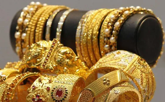 Gold takes gain forward, up Rs 232 on global cues