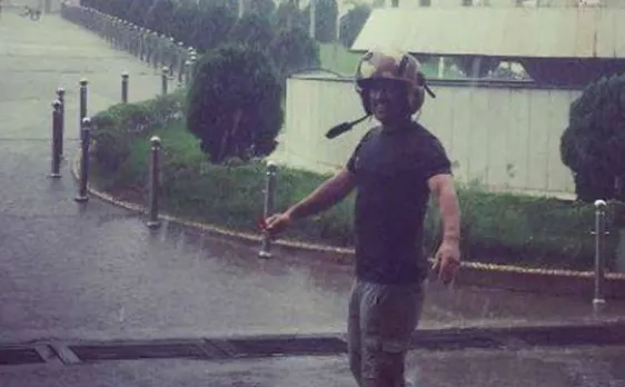 Holidaying Dhoni enjoy Ranchi rain on his bike