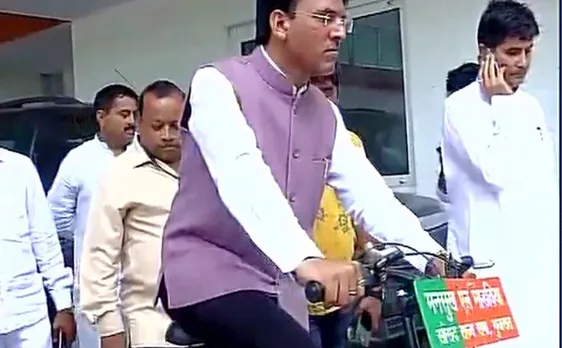 Watch: Mansukh Mandaviya and Arjun Meghwal cycle to President's House