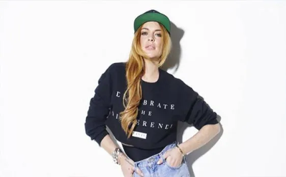 Lindsay Lohan throws off fiance's phone during heated argument