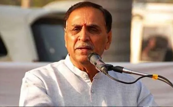 Rupani takes charge; allocates portfolios to ministers