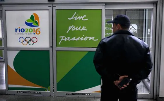 Olympic officer shot in head after wrong turn into slum
