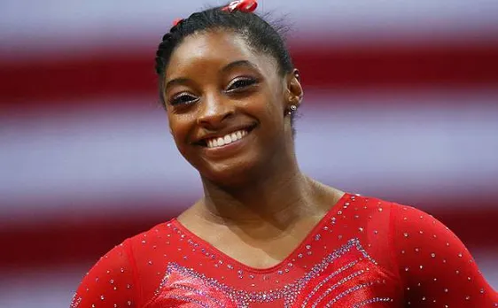 Biles's five gold bid ends as Wevers takes beam title