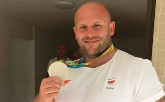 Discus thrower Piotr Malachowski of Poland sells Rio medal to save boy battling cancer