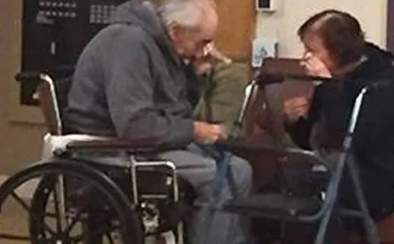 'This is the saddest photo I have ever taken' says grand daughter who captures couple's agonising separation