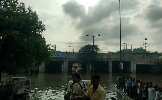 Delhi: Bullock cart carries motorbikes in waterlogged Badarpur underpass