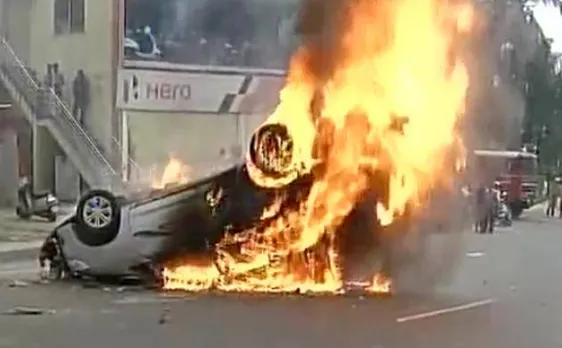 Cauvery water protests: More than 20 buses torched; one killed in police firing in Bengaluru, curfew imposed