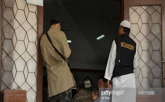 50,000 Muslim hardliners rally in Jakarta accusing Christian governor of blasphemy