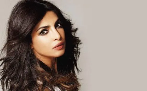 Bollywood Actress Priyanka Chopra poses with puppy in her new Instagram post