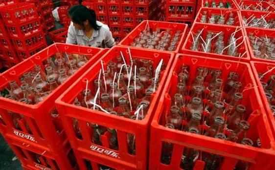 Coca Cola workers in China go on strike over sale of bottling plants to local companies