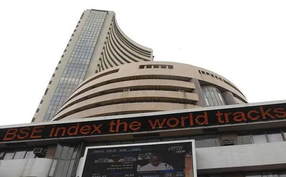 Sensex closes flat, Nifty above 8100 points amid mixed global cues
