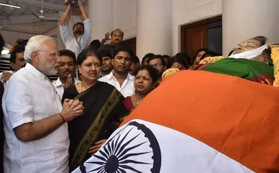 Jayalalithaa's closest aide Sasikala Natarajan remains beside her akka's casket at Rajaji Hall in Chennai
