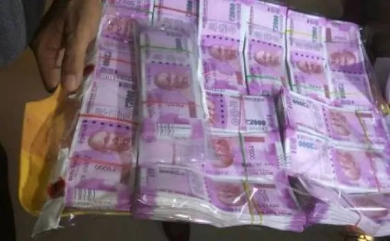 Assam police raids businessman's house, recovers Rs 1.55 crore in new currency notes